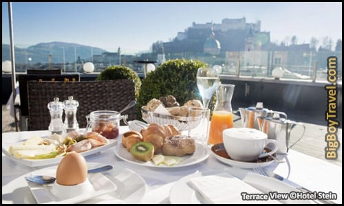 Top Hotels In Salzburg Best Places To Stay - Hotel Stein Seven Senses Restaurant Terrace Rooftop Patio Overlooking Salzburg