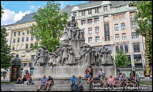 free budapest walking tour map central pest monuments - Vorosmarty Square fountain statue